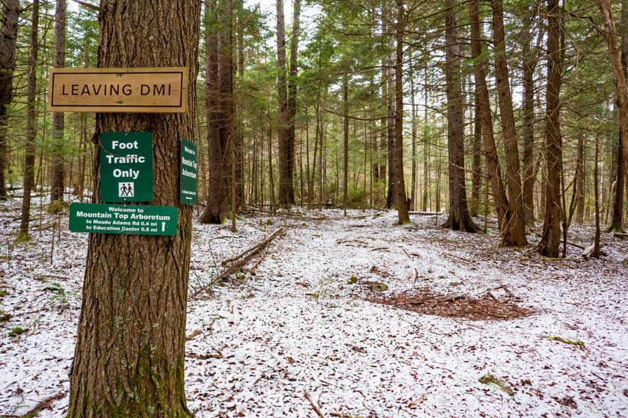 signs showing Mountain Top Arboretum property that only allows foot traffic  
