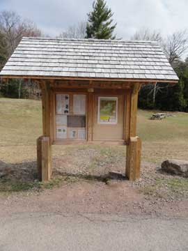 DEC kiosk at the parking lot at the outflow of south lake in north-south lake campground