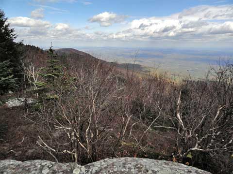 ledge at the base of blackhead mountain with view of acra point