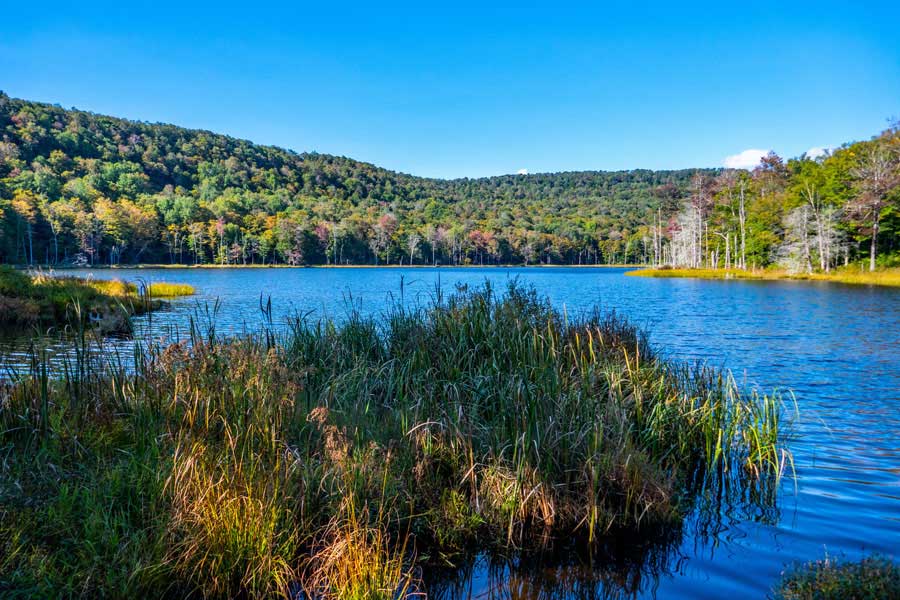 View of Huggins Lake by the dam with mary smith Mountain in the background